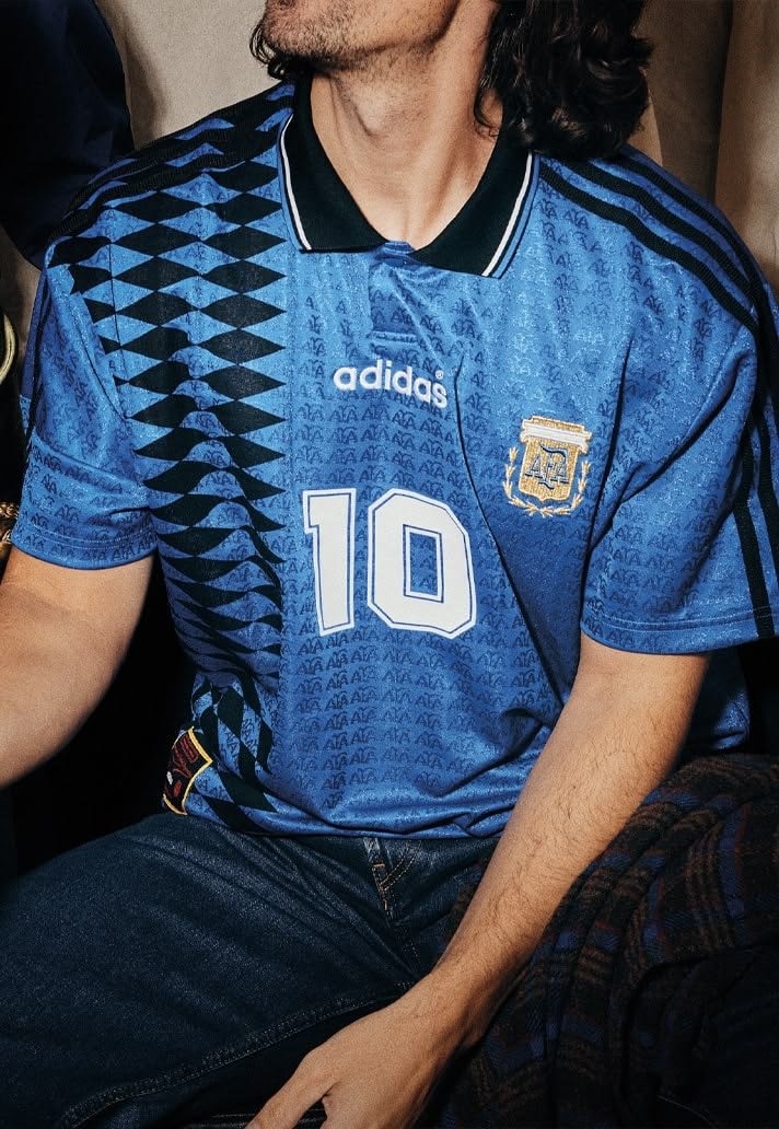 A collector wearing the Argentina 1994 away shirt